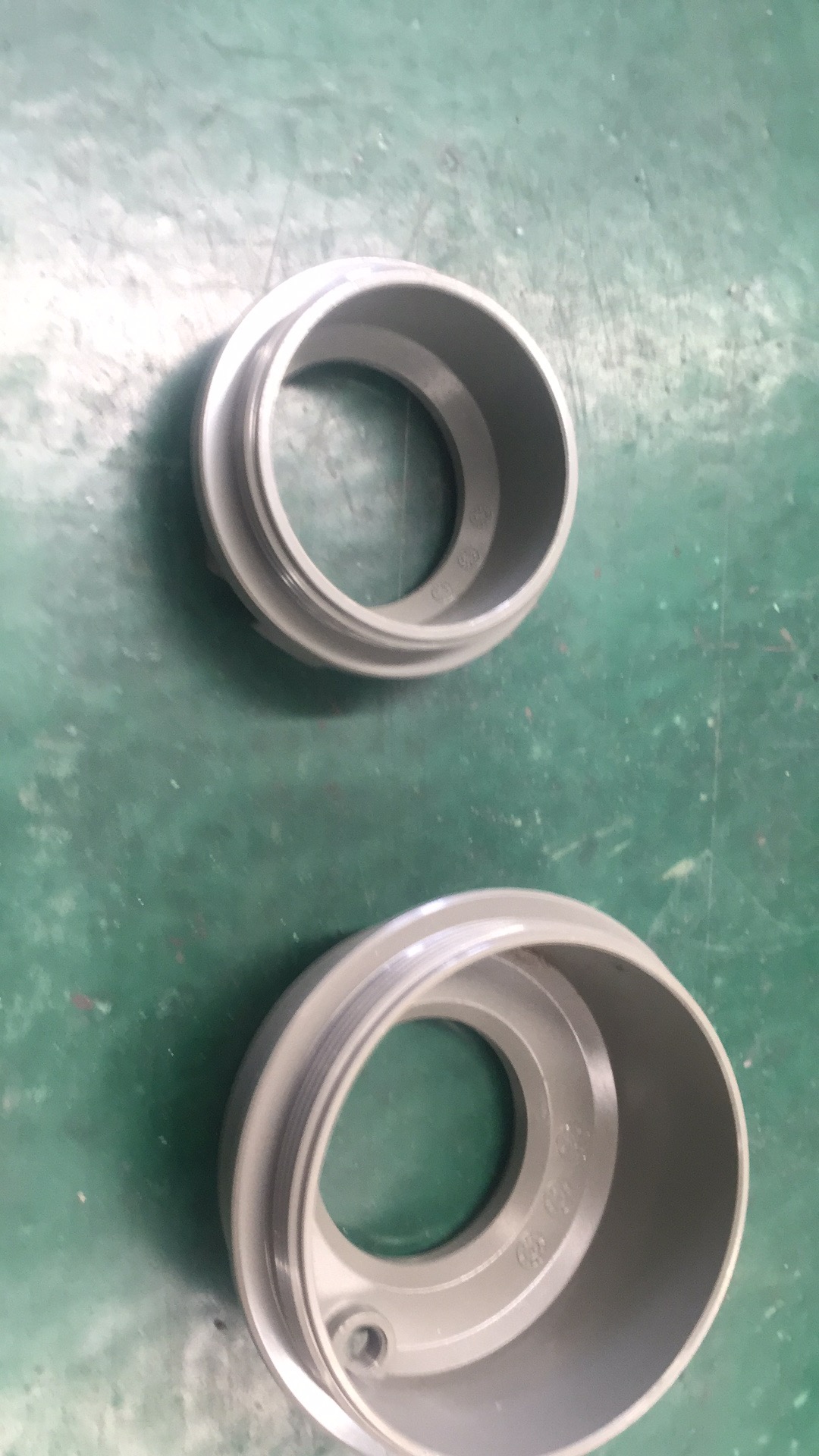 寻求做电泳挂具厂商，要先打样看看效果，主要是挂如图圆状产品使用的