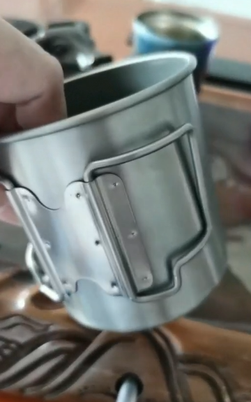 寻求有做手柄件的加工厂，如图，首单几千套，左右两件，钛金属素材