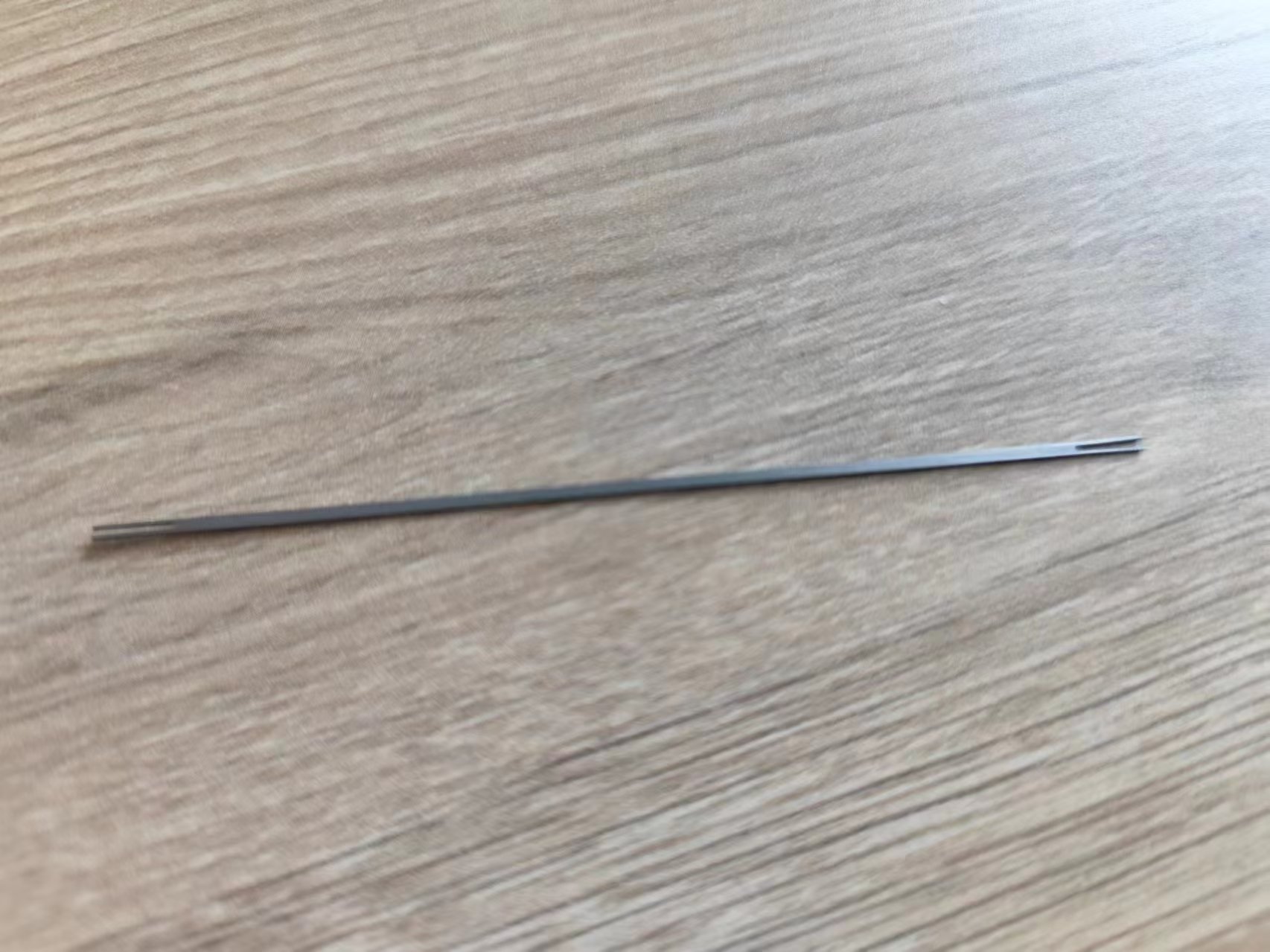 寻能做如图五金件的加工厂，材质是锰钢材质，一个月上万件